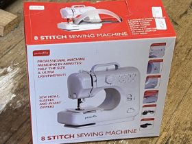 A boxed as new Prolectrix sewing machine (untested)