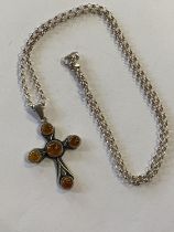 A 925 silver chain and a cross pendant with amber