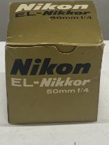 A boxed Nikon EL-Nikkor 50mm f/4 camera lens