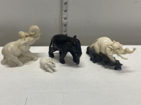 A selection of assorted carved elephants