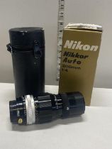 A Nikon Nikkor auto 200mm f/4 camera lens