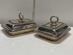 Two heavy silver plated warming trays with covers