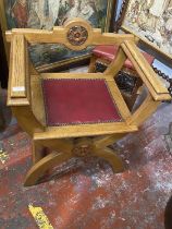 A antique X framed oak bishops chair with red leather insert, shipping unavailable