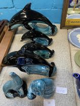 A selection of Poole pottery dolphins and seals