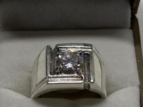 A heavy 925 silver ring with a large CZ solitaire stone
