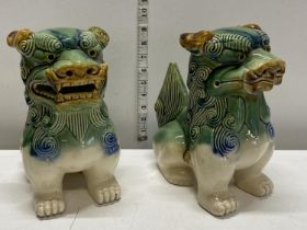 A larger pair of Chinese ceramic Fou Dogs h27cm