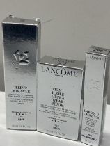 Three assorted Lancome cosmetics