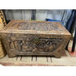 A early 20th century large Chinese hand carved camphor wooden chest with quality relief carving