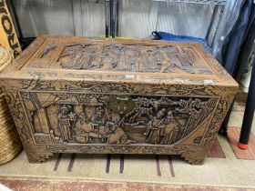 A early 20th century large Chinese hand carved camphor wooden chest with quality relief carving