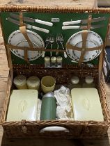 A vintage mid-century Sirram picnic basket and contents. (Looks complete)