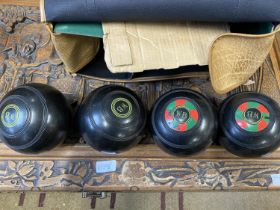 A set of vintage indoor bowls