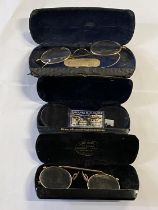 Three cased pairs of vintage gold plated spectacles