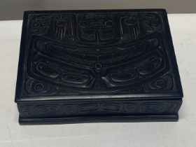 A hand carved Inuit wooden box inscribed on the underside of the lid made by Boma Canada