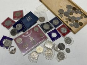 A job lot of commemorative coins and tokens etc
