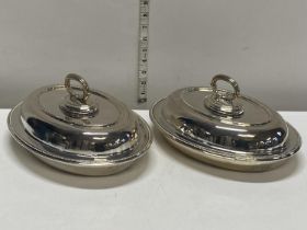 Two heavy silver plated food warmers with covers by Walker and Hall