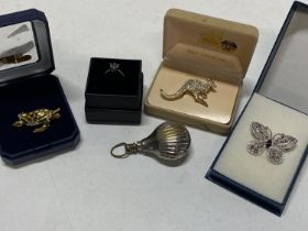 A selection of costume jewellery and a 925 silver pink stone ring