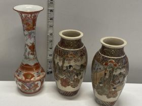 A pair of Satsuma vases and one other Japanese vase