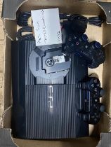 A PS3 slim in working order with controllers and leads