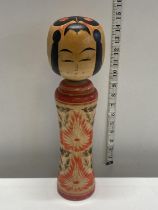 A Japanese Kokeshi doll h38cm