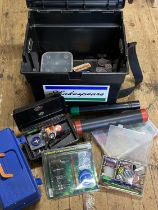 A fishing box and contents of assorted tackle