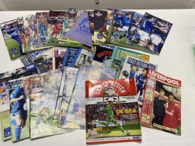 A job lot of assorted football programmes mainly Oldham Athletic also a signed Man Utd programme and