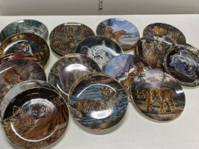 A selection of Royal Doulton and Franklin Mint Tiger themed collectors plates