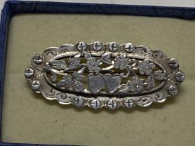 A vintage hallmarked silver sweetheart brooch