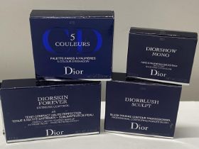 Four assorted Dior cosmetics products