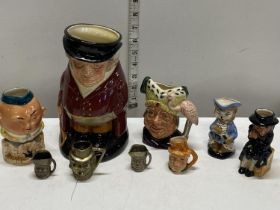 A selection of assorted collectable Toby jugs including 'The Huntsman and The Ugly Duchess'