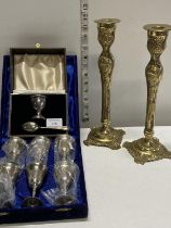 A selection of EPNS ware and two vintage brass candlesticks