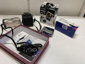 Five assorted vintage cameras including Olympus and Polaroid (untested)