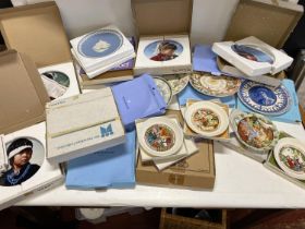 A job lot of assorted collectors plates including Wedgewood etc, boxed with certs