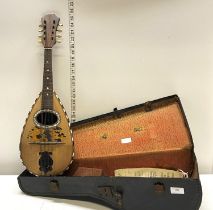 A early 20th century cased Marco Rebora mandolin with inlay detail