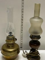 A vintage brass and glass oil lamp and one other converted for electric use