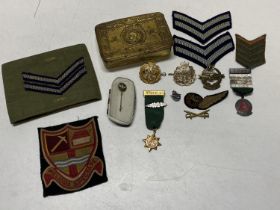 A Princess Mary WW1 Christmas tin and a selection of assorted military themed items