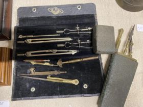 A selection of assorted technical drawing instruments