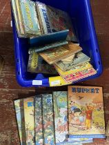 A job lot of assorted vintage Rupert annuals and Ladybird books etc Shipping unavailable