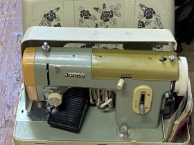 A vintage electric Jones sewing machine in working order shipping unavailable