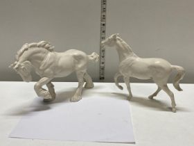 Two Royal Doulton white ceramic horses