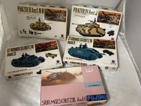 Four assorted Nitto model kits and one Fujimi (unchecked)