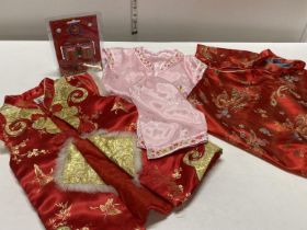 A selection of Oriental child's silk clothing etc