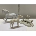 A selection of white ceramic horses including Royal Doulton