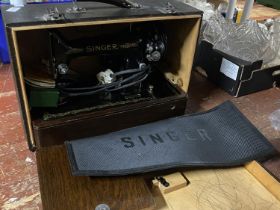 A vintage Singer electric sewing machine (untested), shipping unavailable