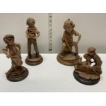 Four Giuseppe Armani resin figures on wooden bases