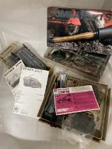 A selection of assorted loose model kits (unchecked)
