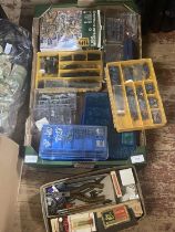 A job lot of assorted toy solider figures and modeler's accessories