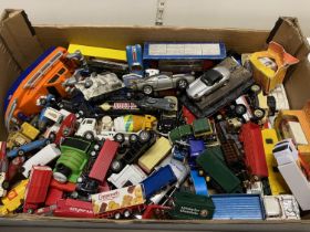 A box full of assorted die-cast models