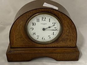 A vintage Dyson and Son of Leeds oak cased mantle clock