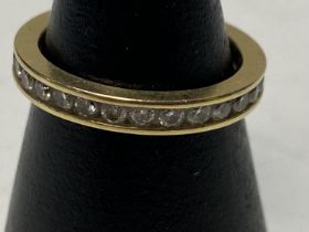 A 18ct gold and diamond full eternity ring 3.90g. Size N. Approx 1ct of diamonds total.