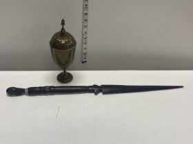 A unusual brass lidded vessel and a African themed ceremonial wooden dagger